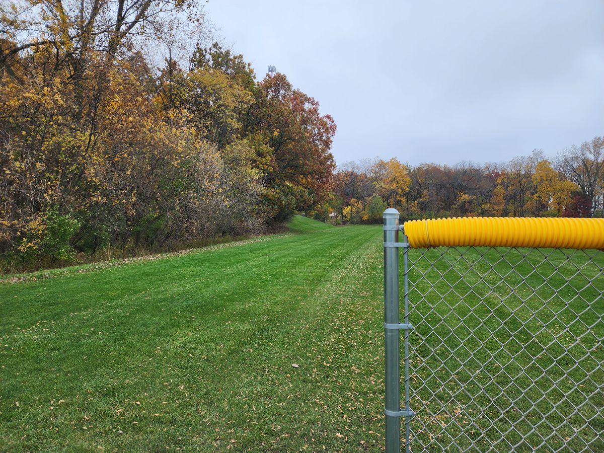 View of hole 3 basket from baseball field fence.