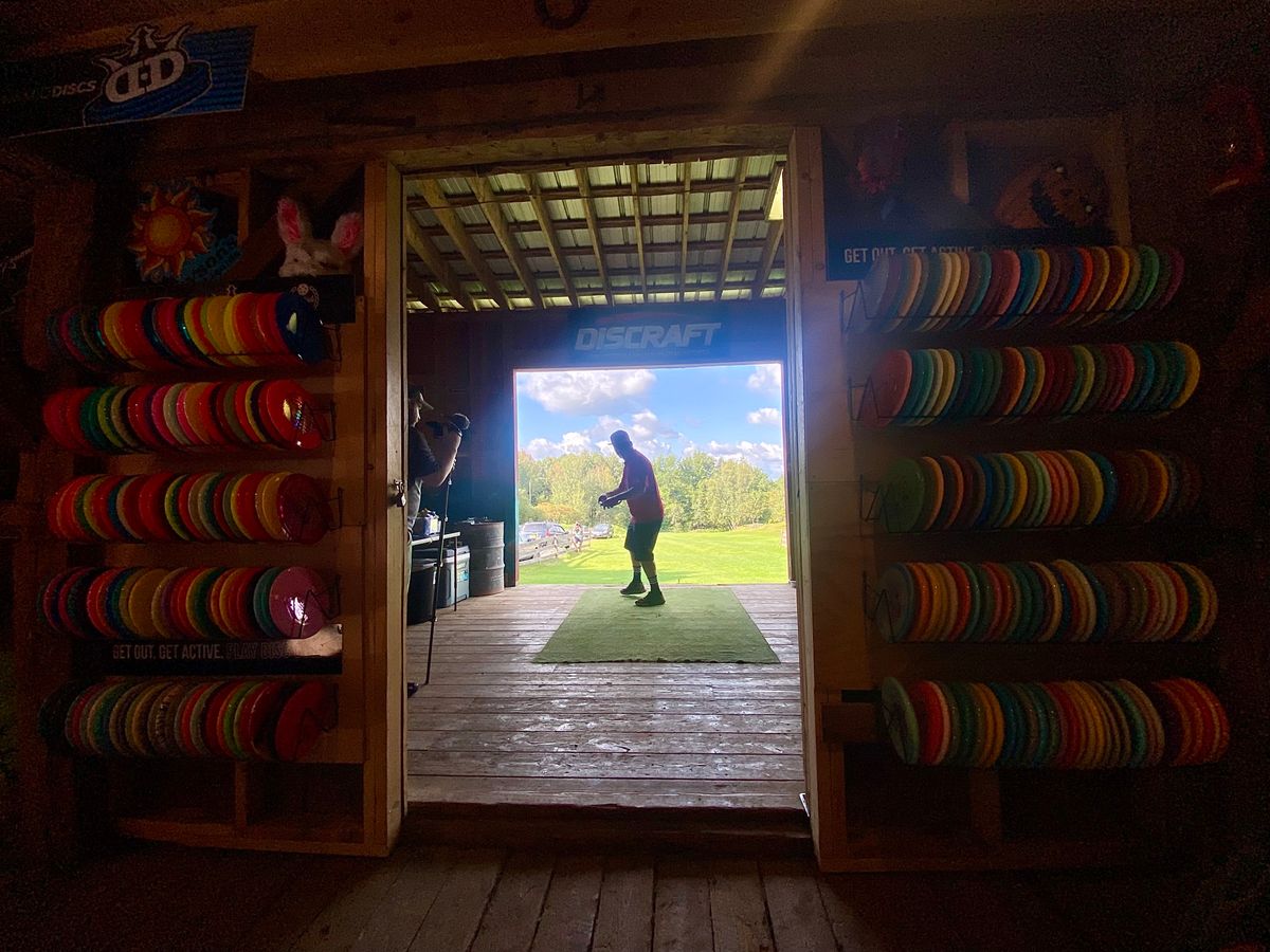 Pro shop view of the iconic hole 1 gold tee