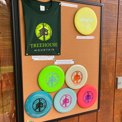 Treehouse Mountain stamped discs for sale at bathhouse
