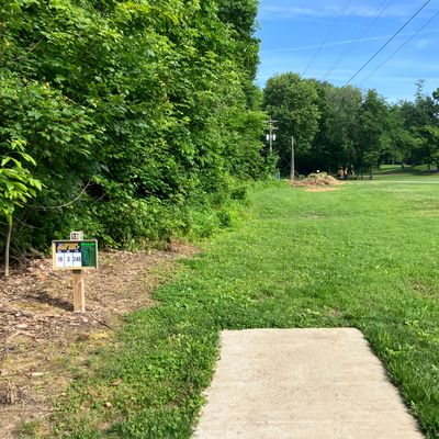 Hole 18 250’ along tree line. Basket is 20ft to the right of tree line. Creek is behind tree line.