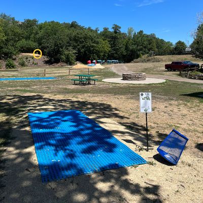 Hole 2 - Fun shot. The pin rests atop a dirt wall