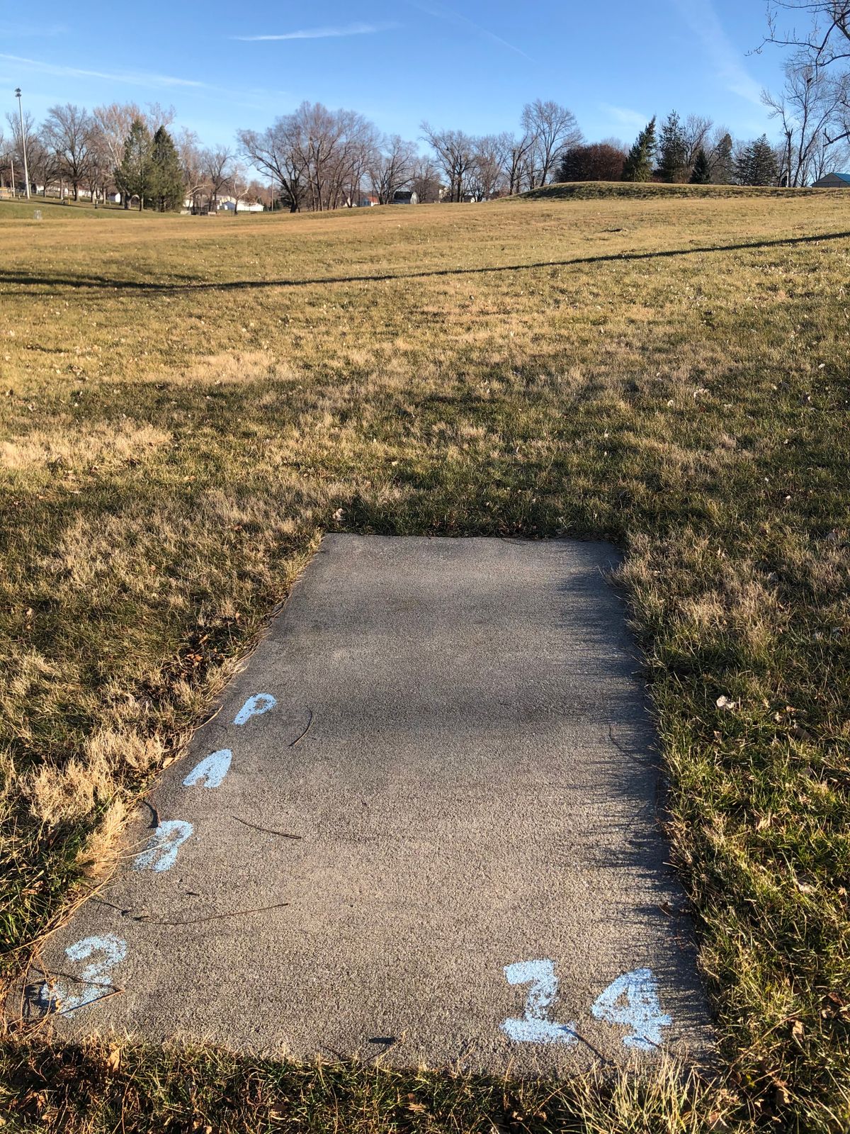 Tee pads short and the only signage on course
