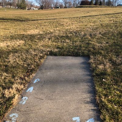 Tee pads short and the only signage on course