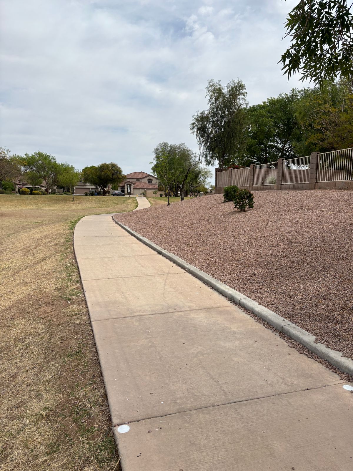 Hole 7- Mando left of marked tree. sidewalk running river, play as hazard. Fence & beyond OB.