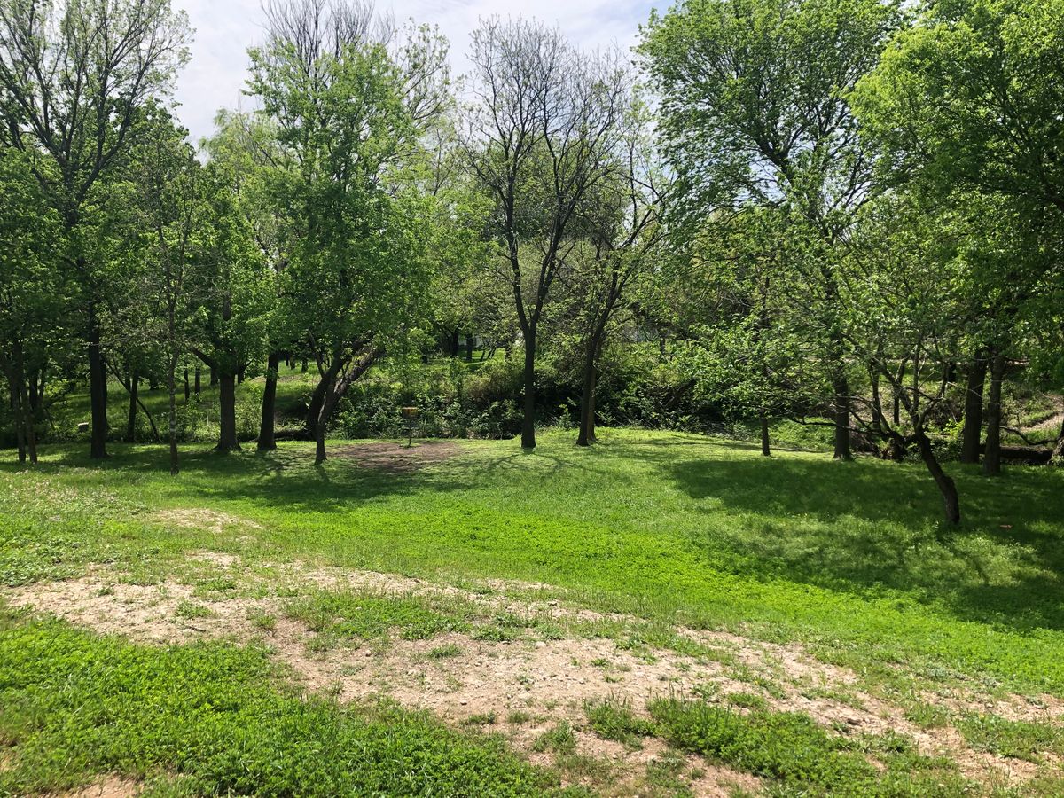 Hole 4’s basket with water behind.