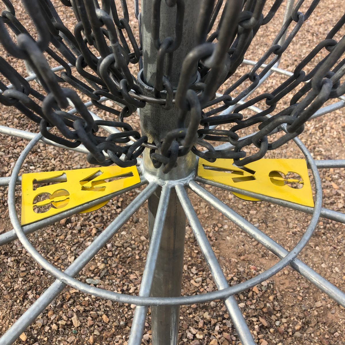 Follow the arrow to tee pad 8 or 18