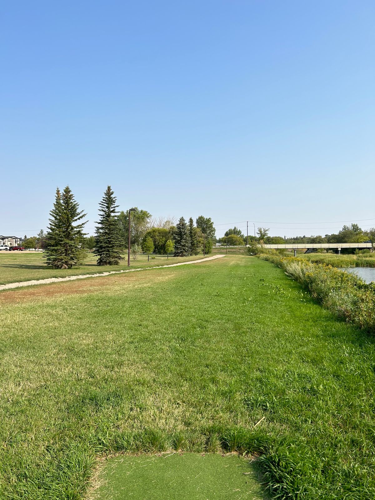 Hole 8 - walking path and beyond to the right OB
