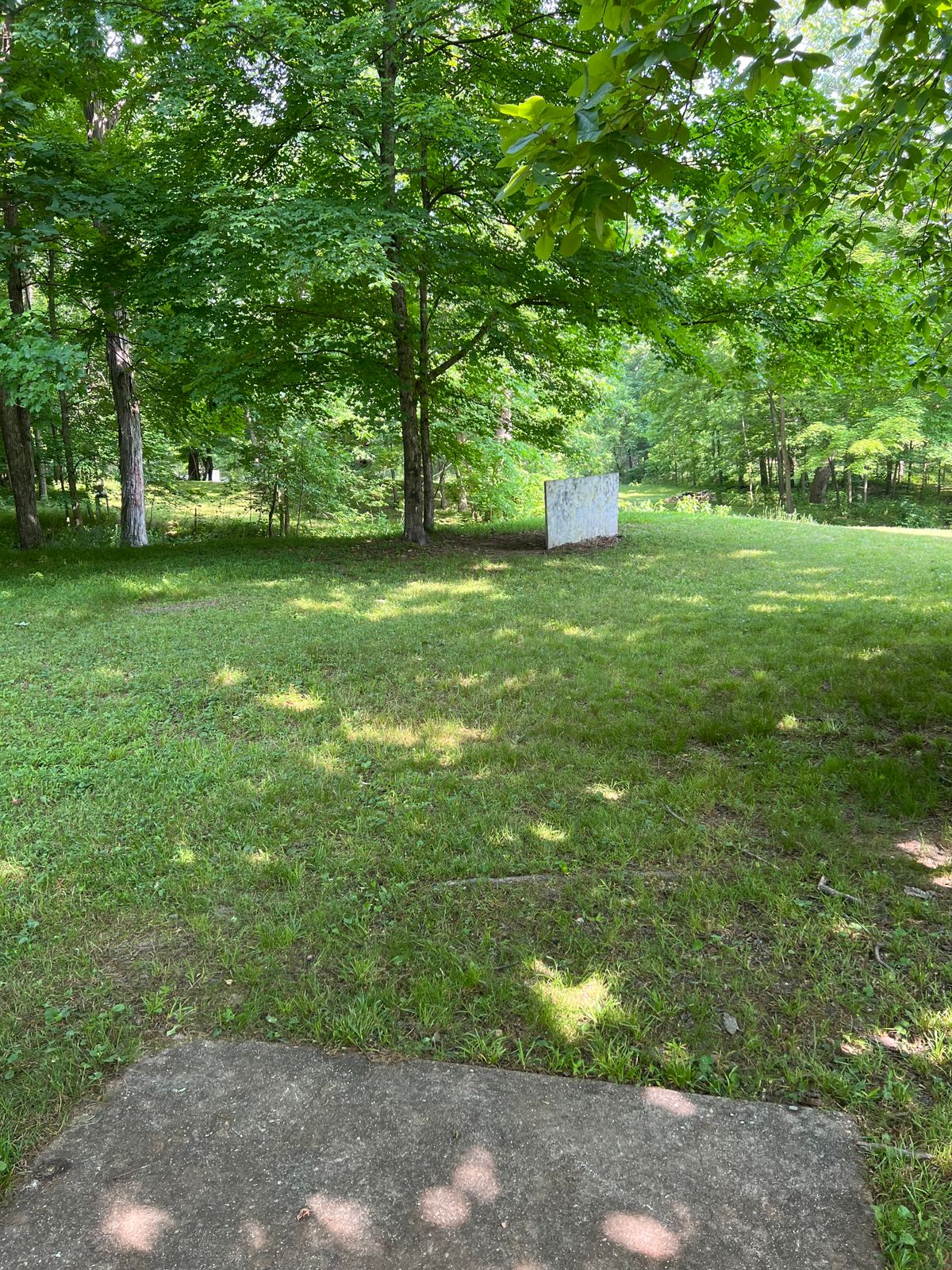 Hole 7, the Cabin hole, dog leg left with creek danger to the right.