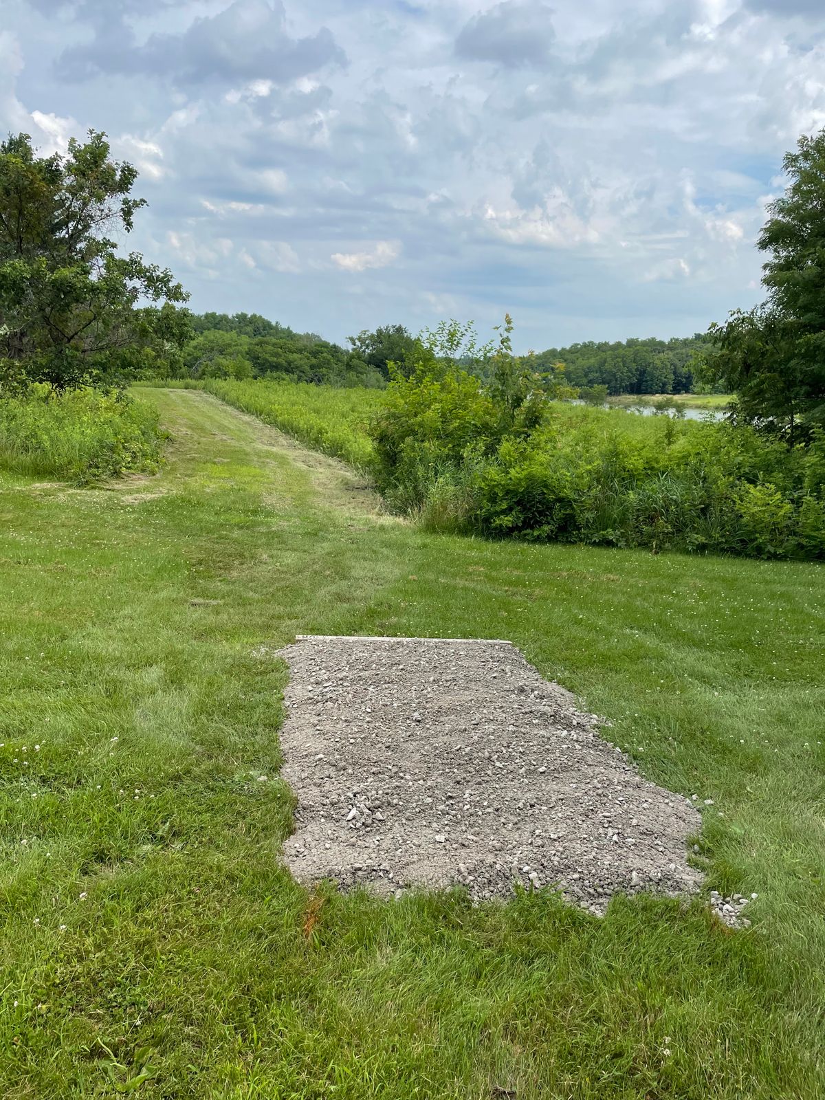 Hole 2 Tee Pad (Narrow fairway + extremely dense rough on either side)