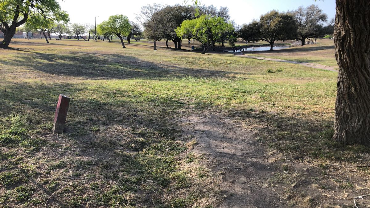 “Red” uneven dirt tees.