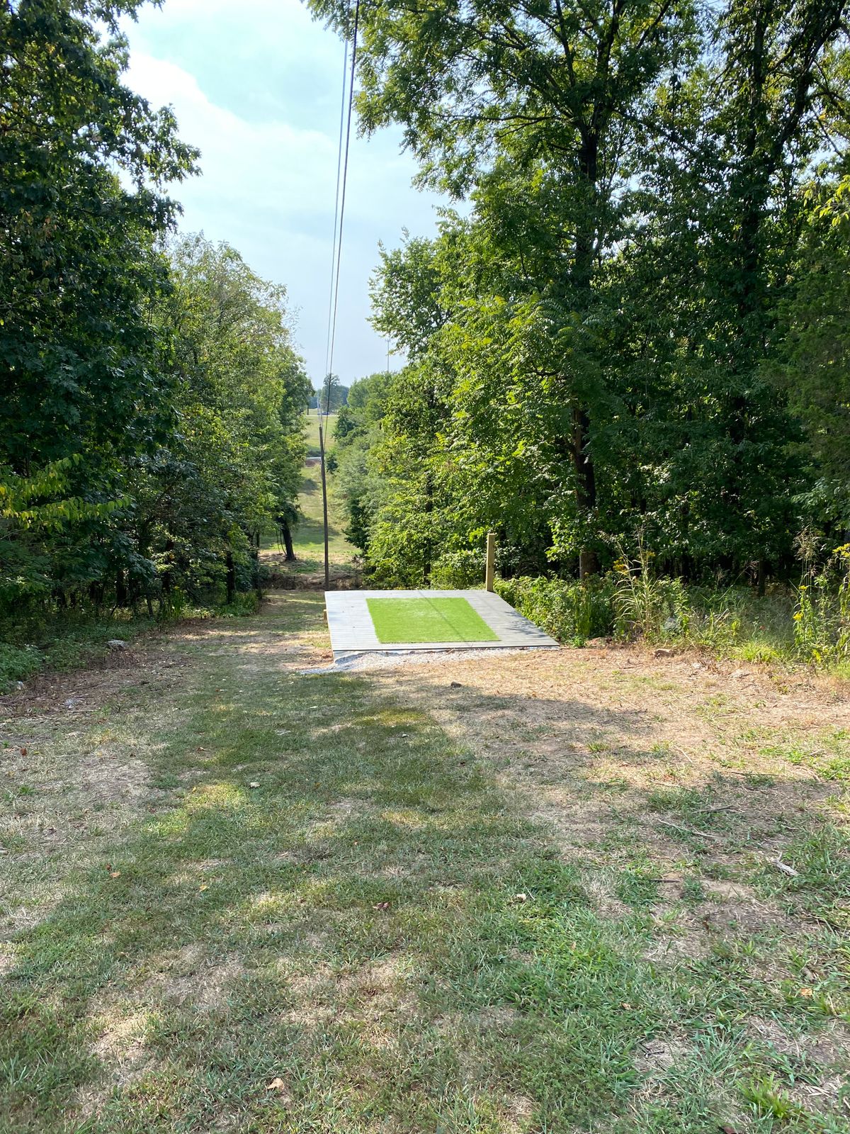Hole 6 straight down the fairway then a sharp left and another 250 ft to the basket.