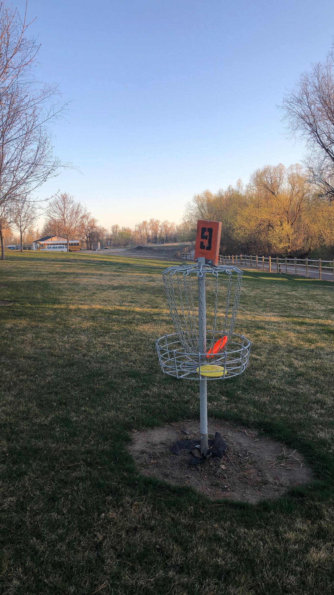 Most baskets are easy to see with wide open approaches. No pads, tee off from the basket.