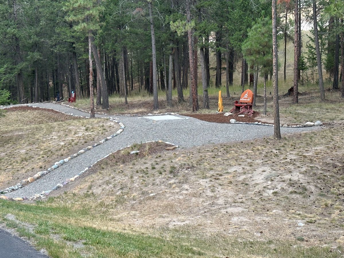 Hole 17 black and gold tee Pads (and make out bench)