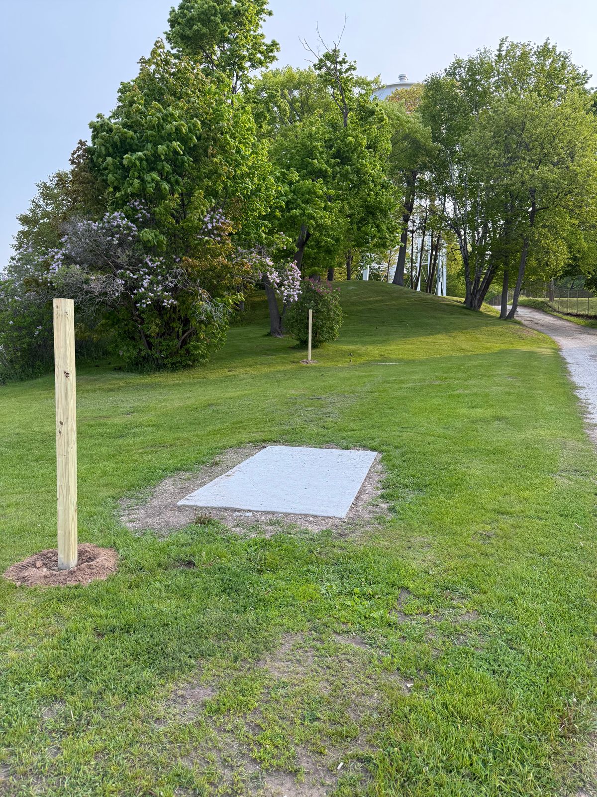 First tee. New concrete tee pads (found at all 15 longs) and new post awaiting signage.