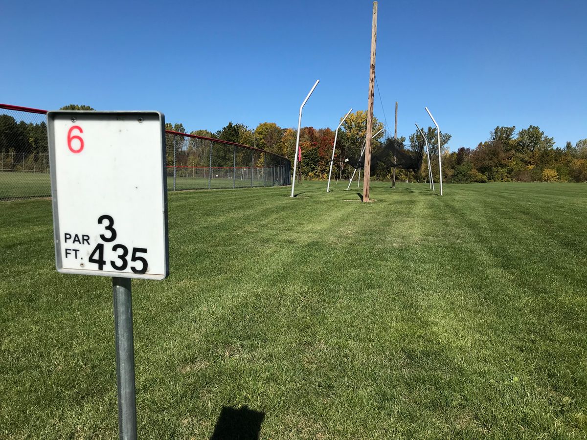 Hole 6. North of track. Careful of batting cage and baseball field