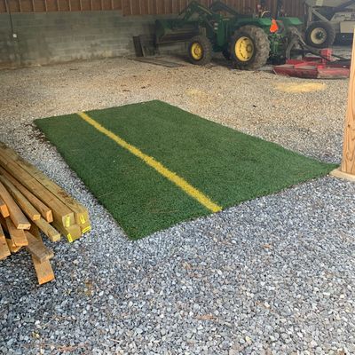 Turf for 18’s teepad is inside shed behind the tee