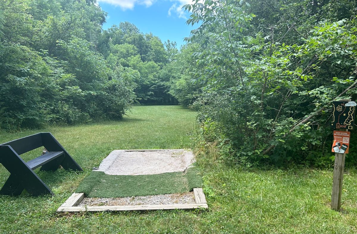 Hole #1 Tee pad and sign