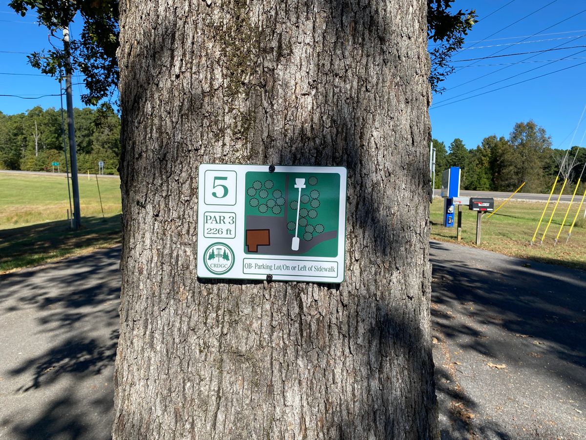 Hole 5 sign (white)