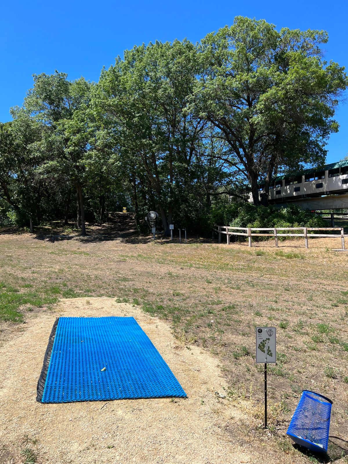 Hole 7 - Pin illuminates at the top of a steep, wooded tunnel.