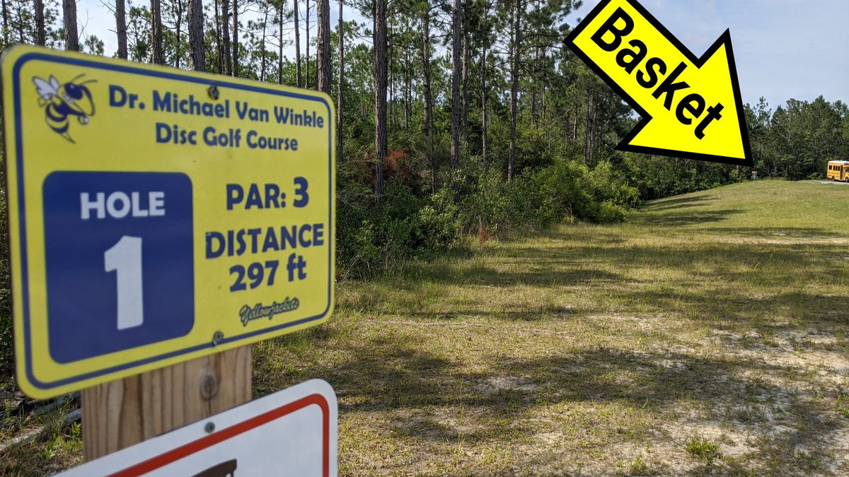 Hole one is straight back in the middle of the parking lot  to the right and behind the pavilion. Best shade of the morning.