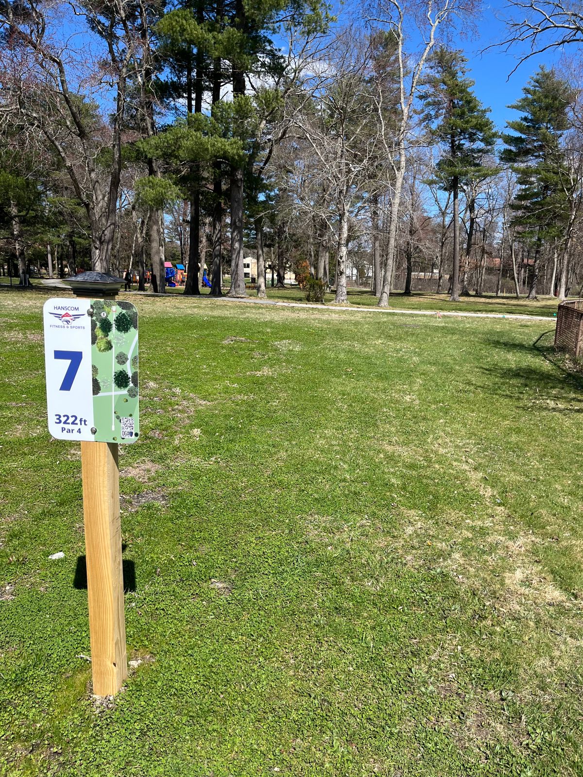 Hole 7. Play area to the left and walkways center and right and long