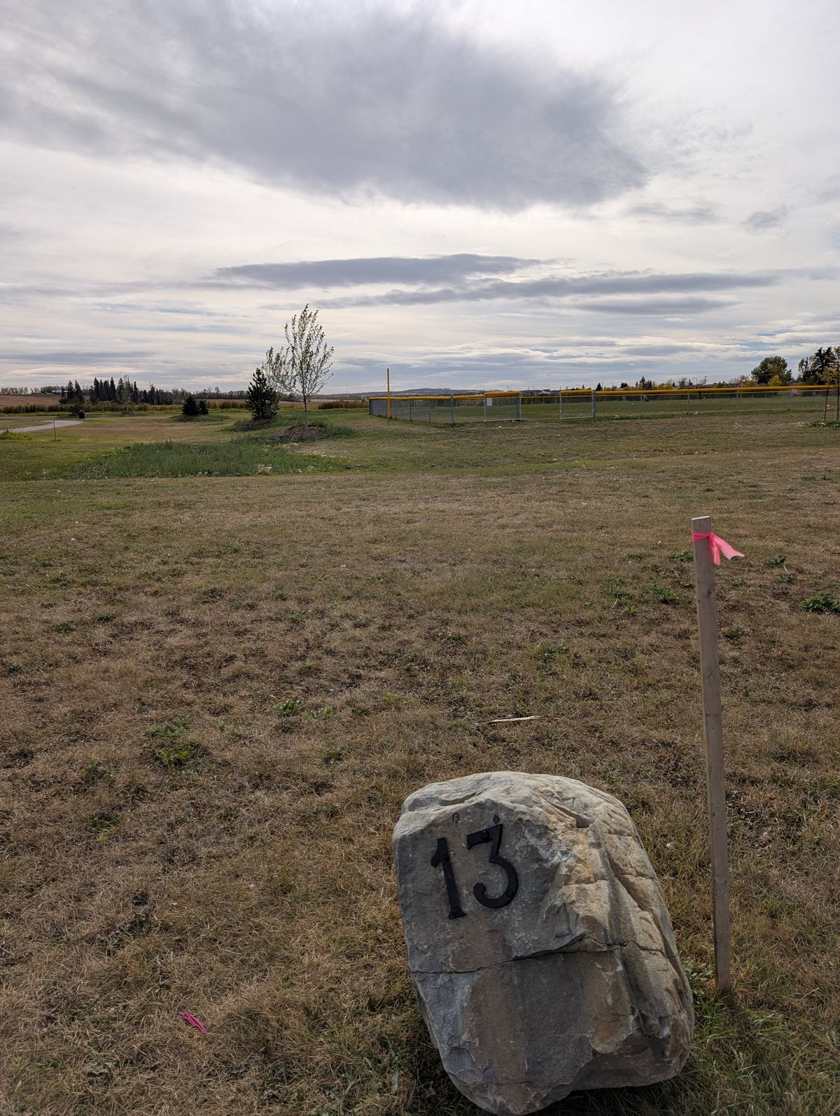 Hole 13. Around the back of the ball diamond to the left.