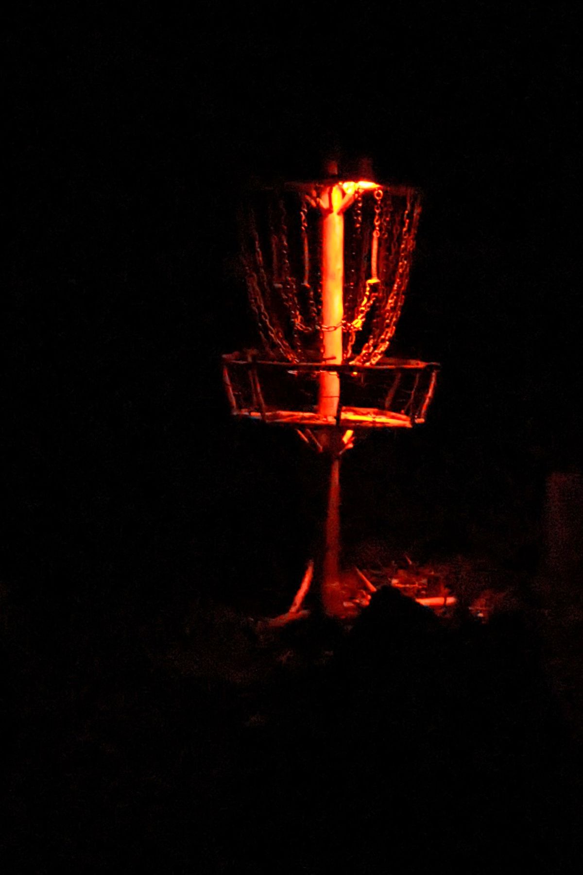 Night shot of the DIY basket on Hole 18.
