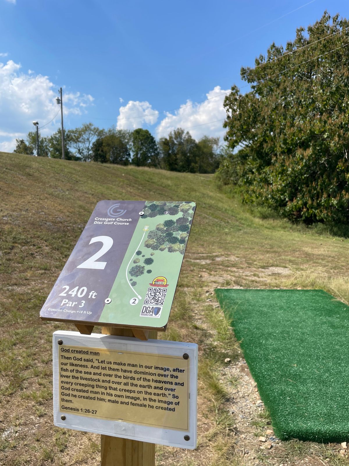 Hole 2. Hard right. Flat at top. Drops behind basket.