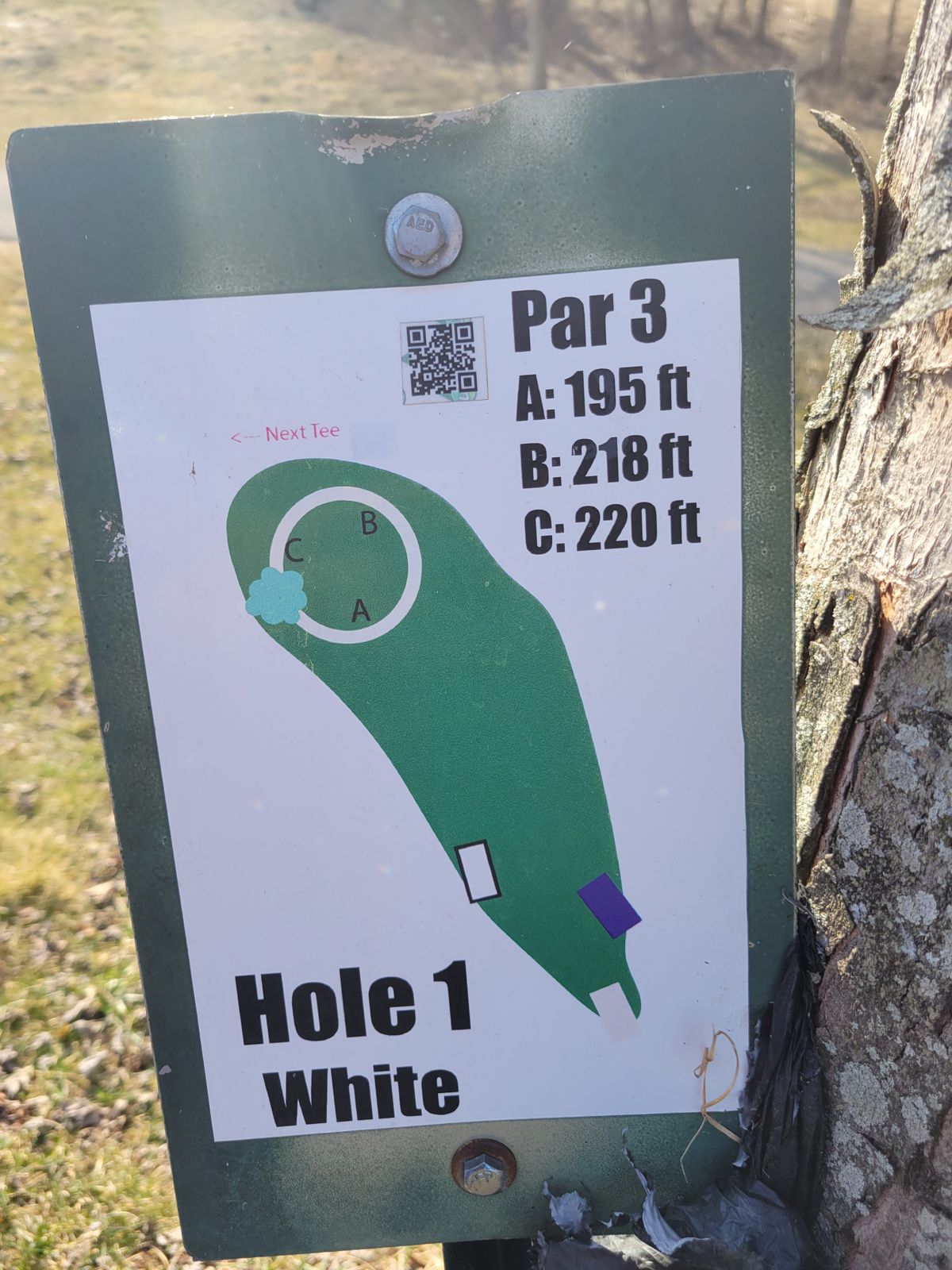 Hole 1 is top left of gravel parking lot