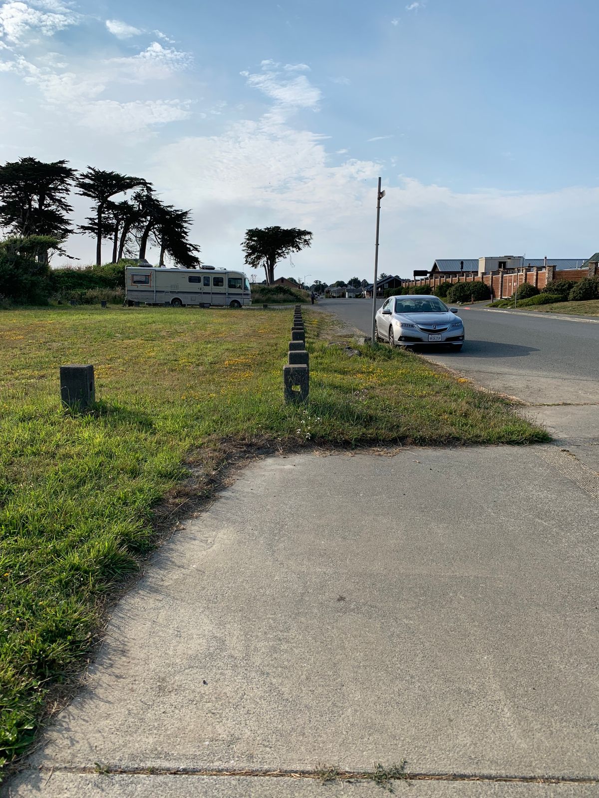 “Teebox” for 18 is sidewalk. On top of avoiding the car and RV, there’s thick bushes before basket.