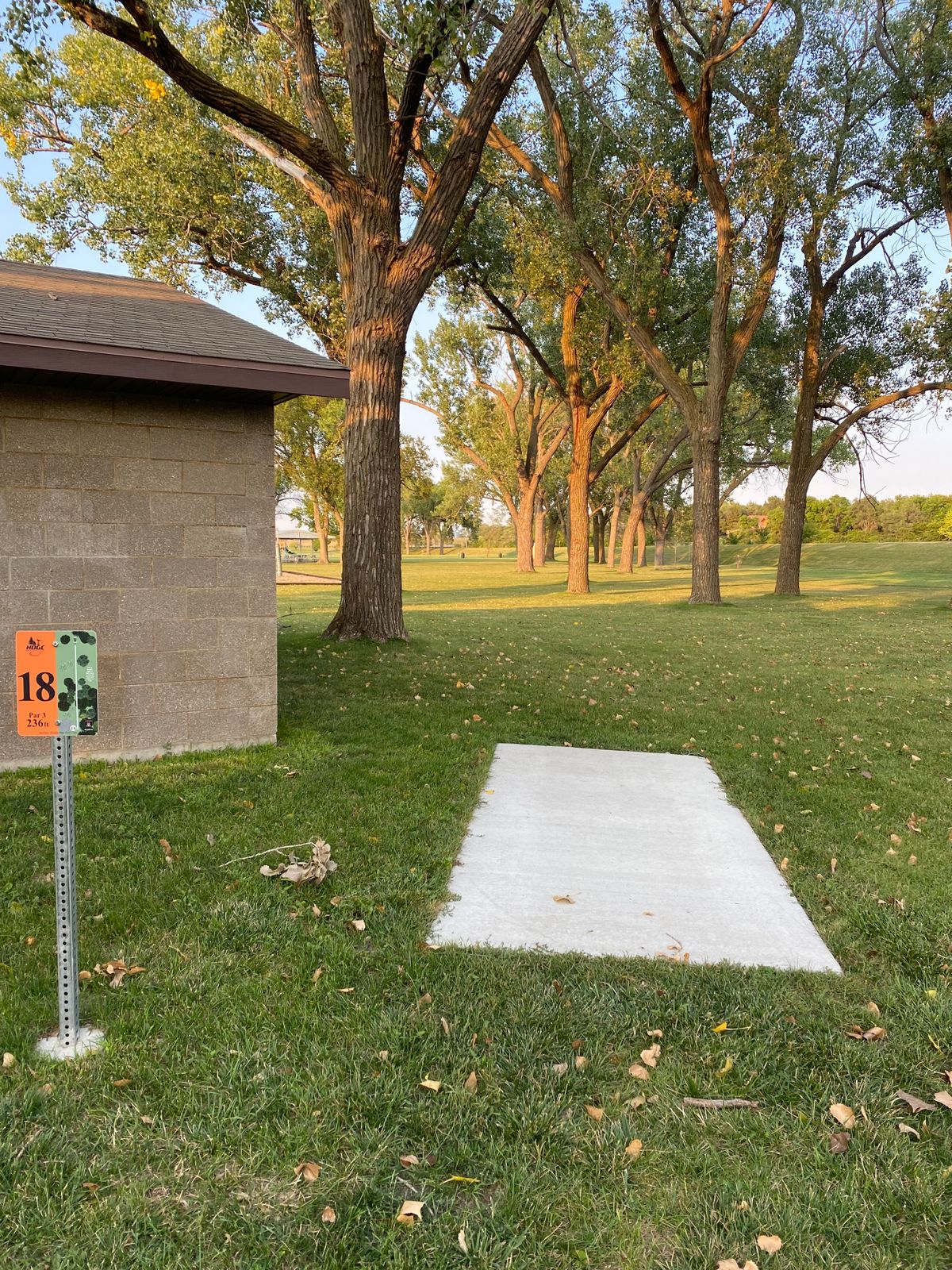 #18 uses basket #9 directly behind the trees 263’ straight ahead. VB court is OB