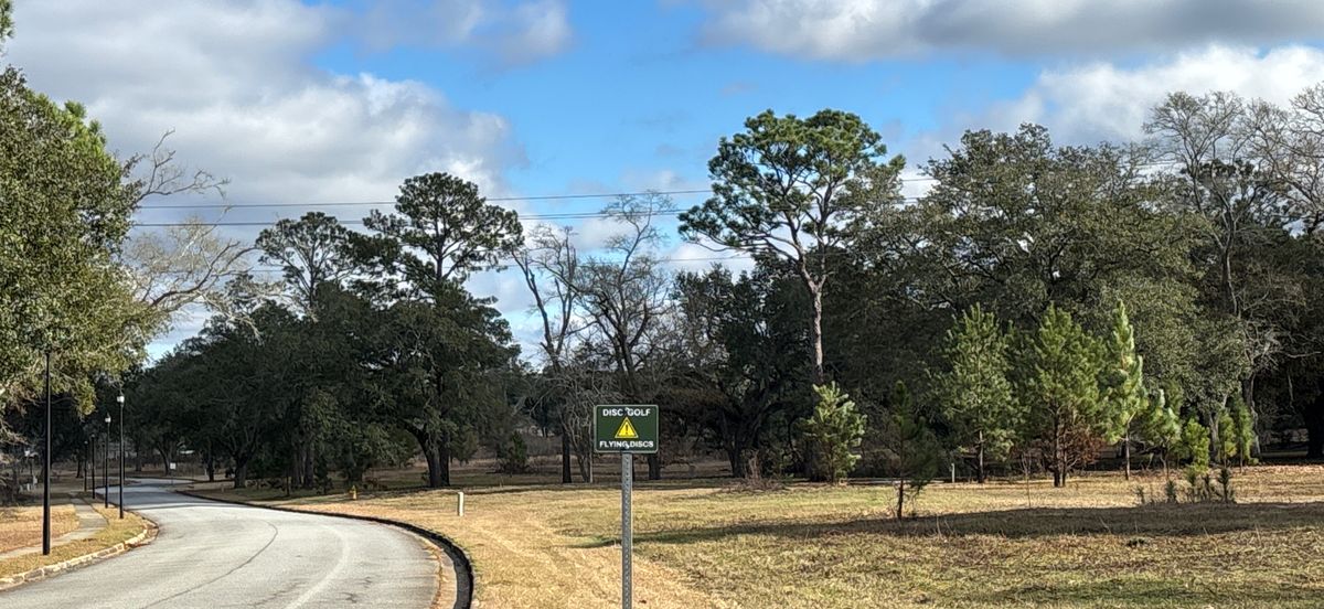 Crossing sign hole 11 to tee 12 and hole 14 to tee 15