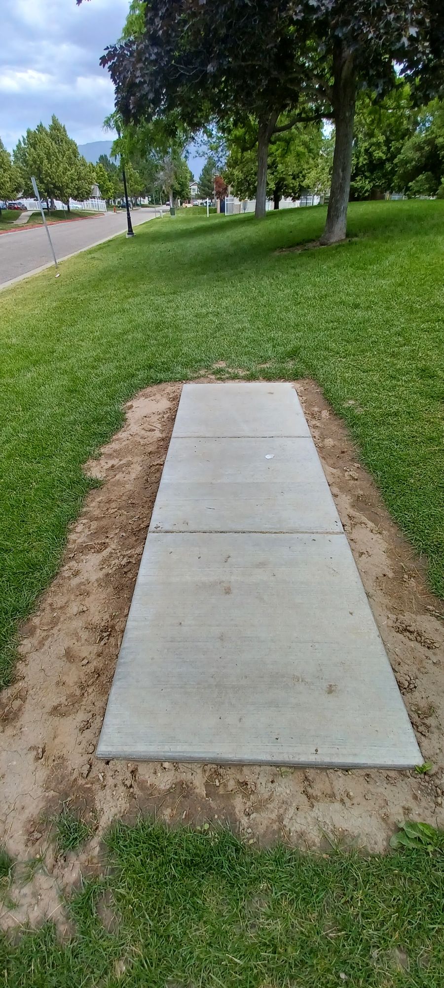 4th Tee Platform, basket to the middle right side of platform.

Watch out for others, there is a walking path by basket & along the other side of the hill.

*This is the 13th hole as well, if you are using the 18 hole scorecard.