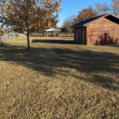Basket is on other side of covered picnic area