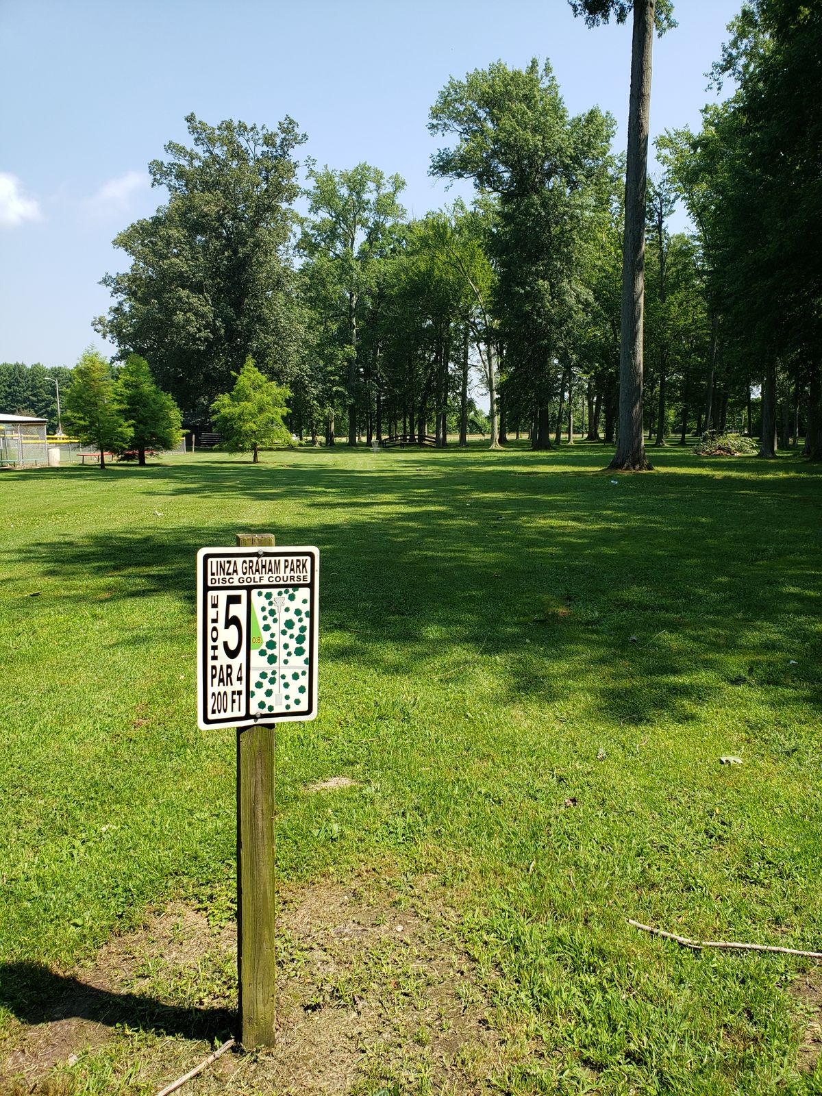 #5 Sign and Fairway, should be Par 3 for seasoned players.   OB on left.
