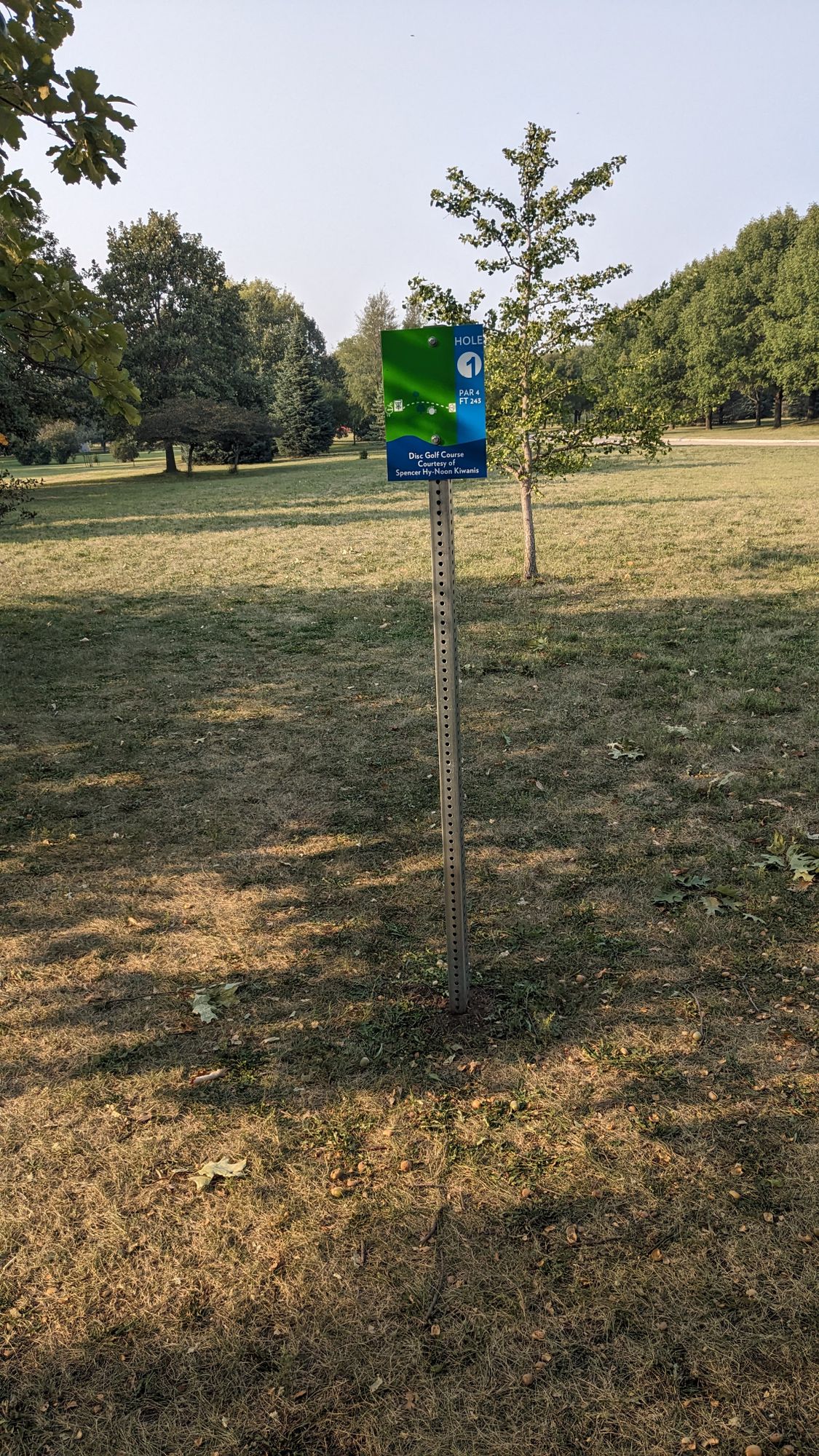 1's tee with the old sign