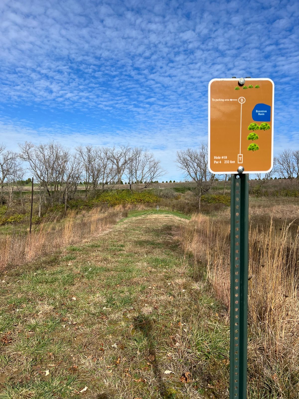 Hole 18 Dead straight, no trees, and 212 feet.