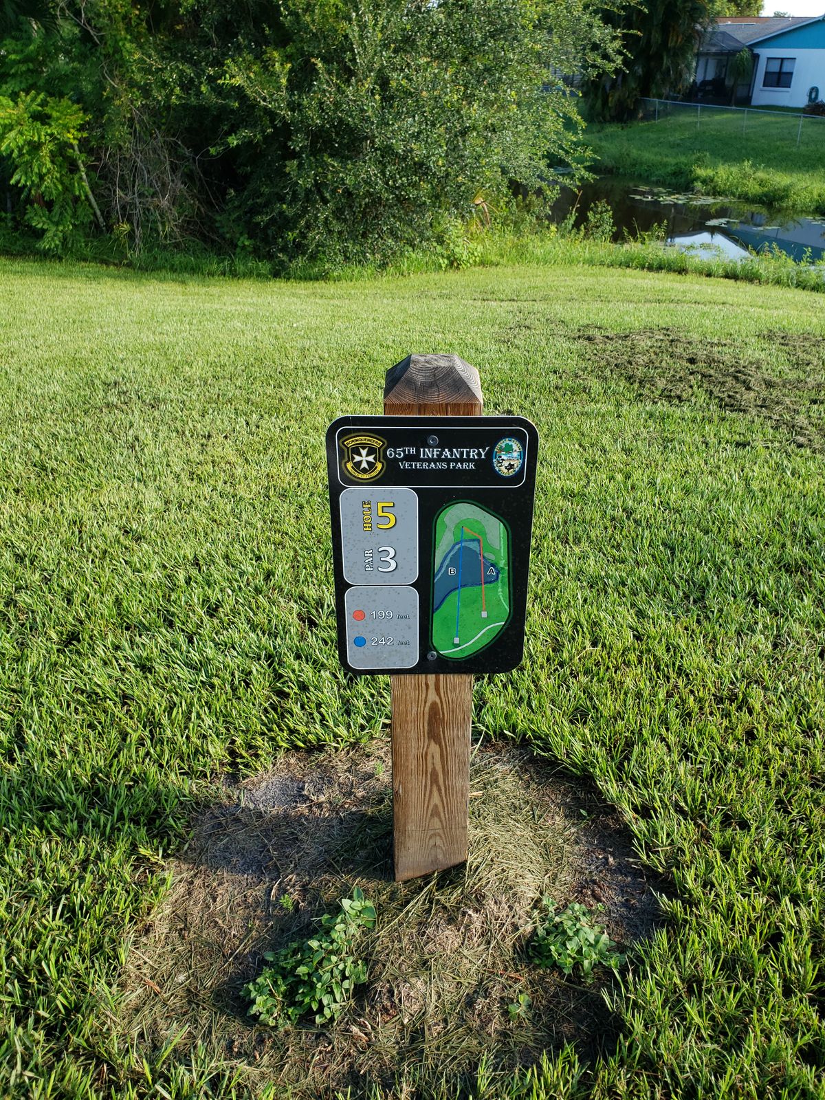 #5 Long Tee Sign.