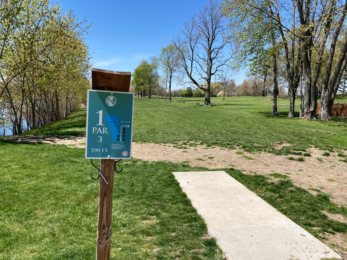 OB pond to left; mandatory 200+ feet down fairway: must pass left of tree trunk