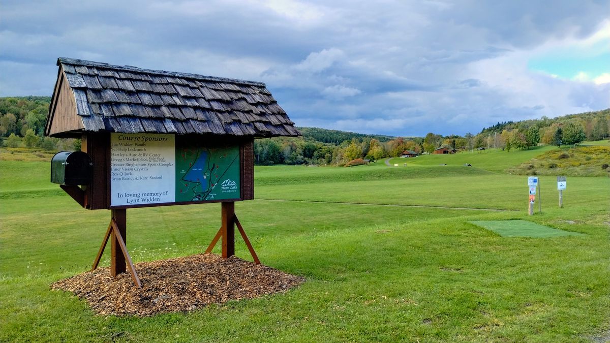Hole 1 tee and course Kiosk with disc return box