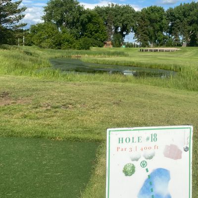 Hole 18. 400ft over water