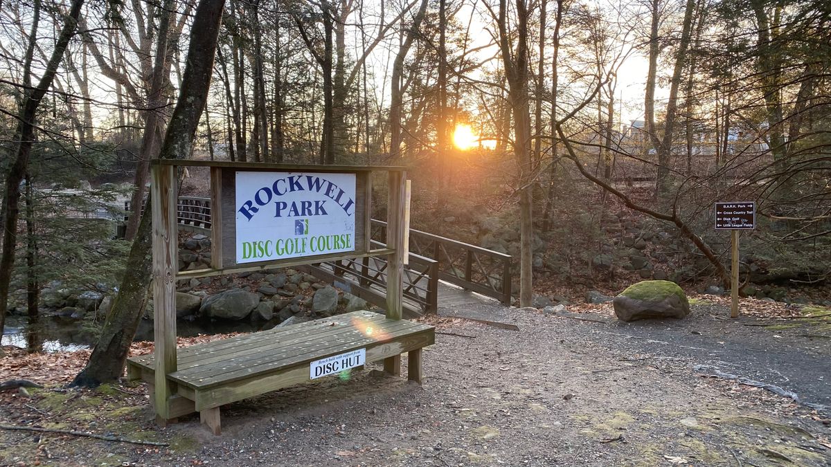 Course sign at sunrise