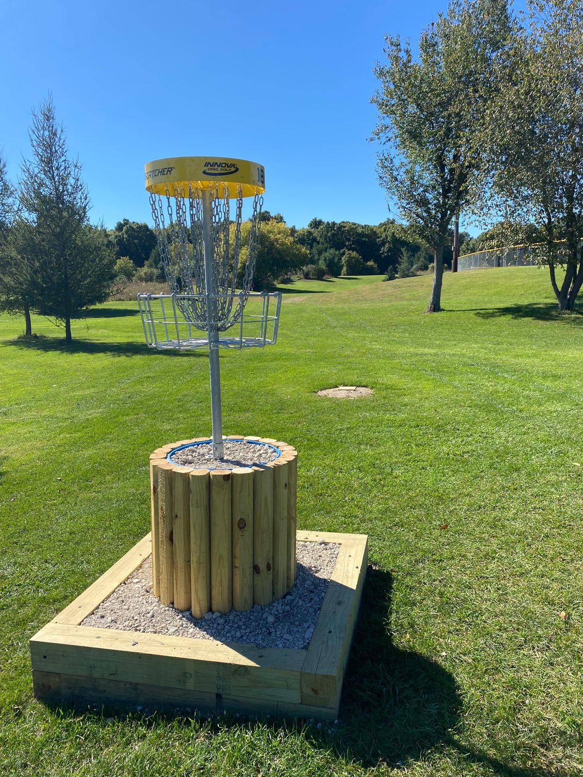 18s basket looking back down the fairway