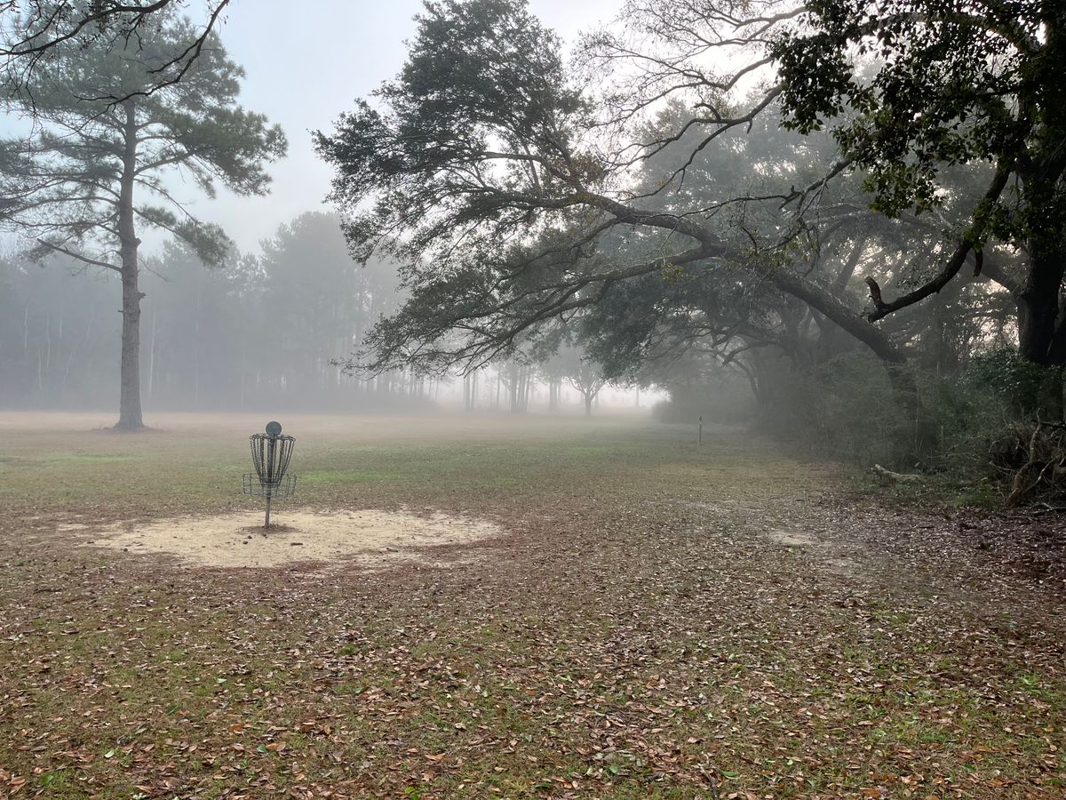 Hole 18, picture from the parking lot on a foggy day.
