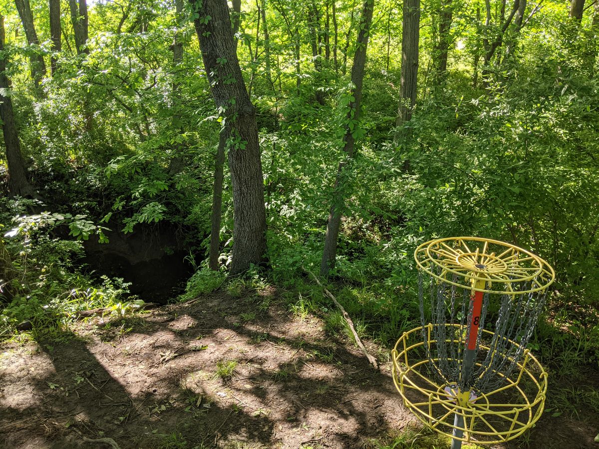 STEEP DROP OFF BEHIND 8'S BASKET