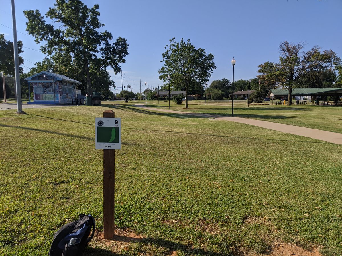 Hole 9: a little short shot right behind that tree