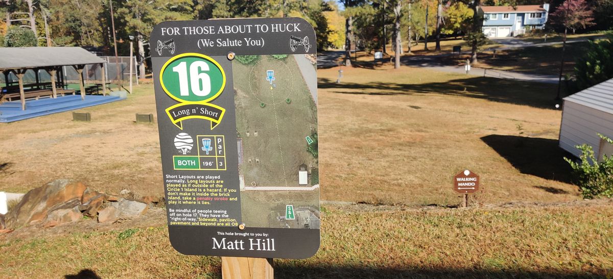 Hole 16 tee sign and fairway.