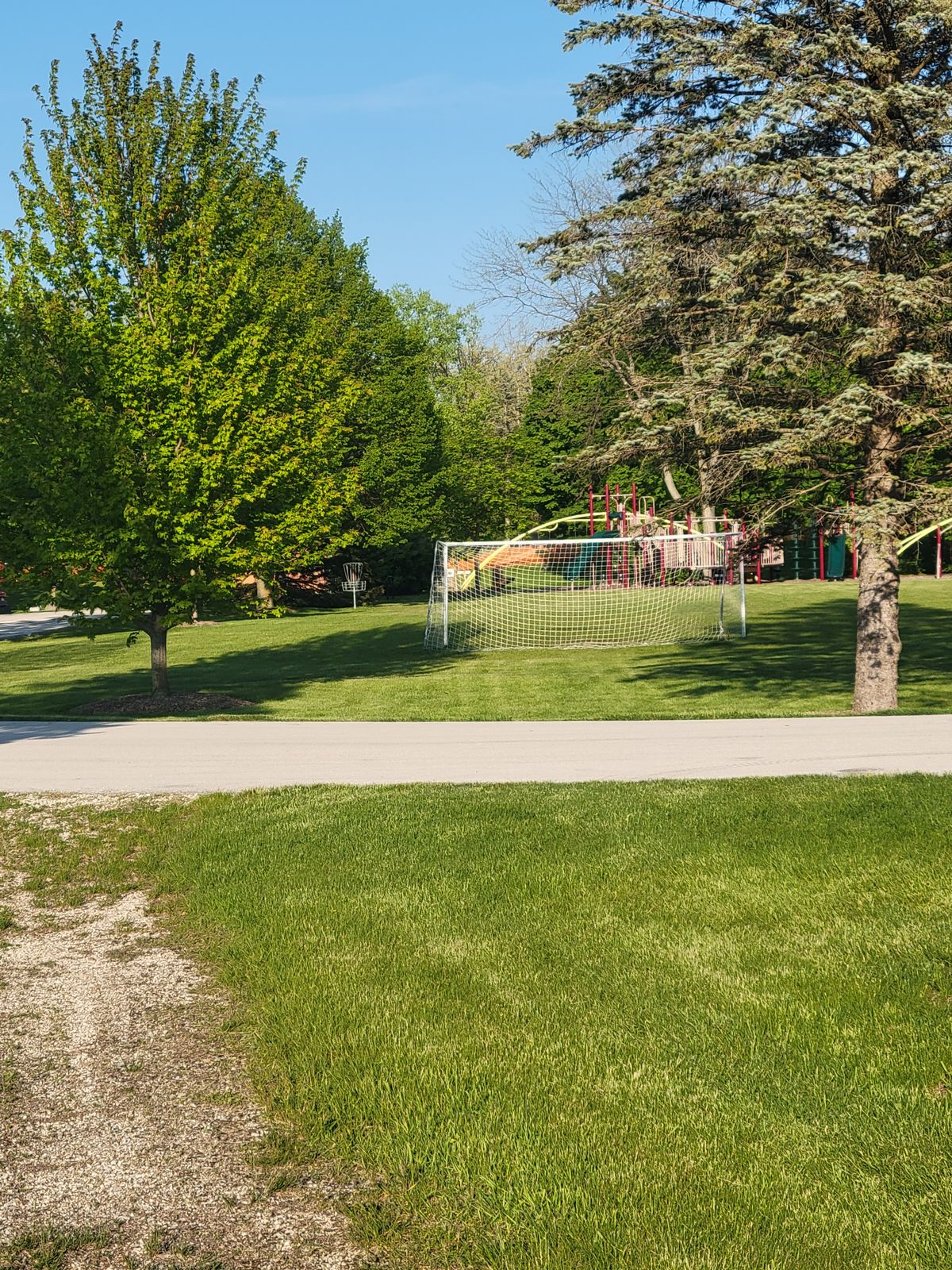 You tee off over a soccer field towards a playground. What could go wrong?!