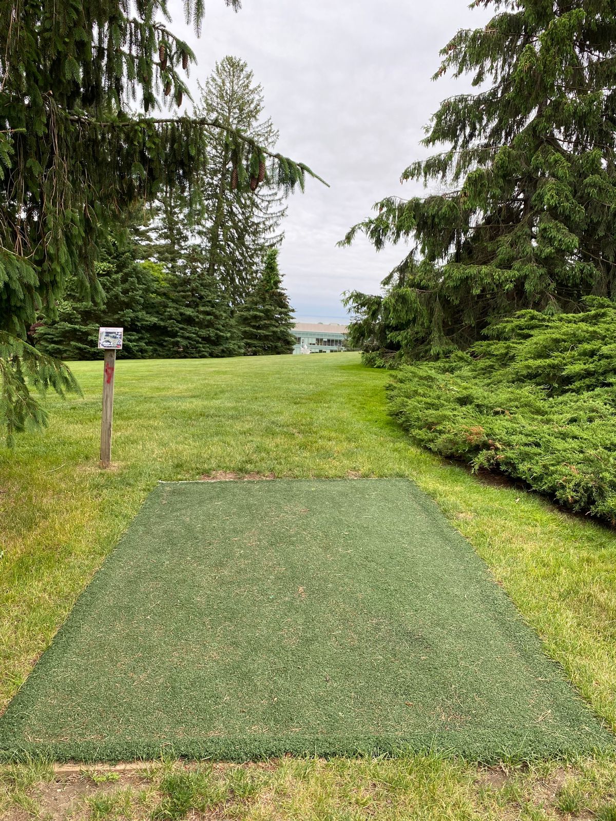 Hole 9 tee pad. Long Island sound off in the distance