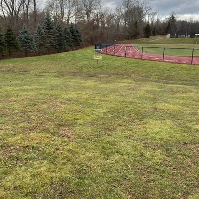Looking at Hole 2 basket from the middle of the fairway. (Soccer field)